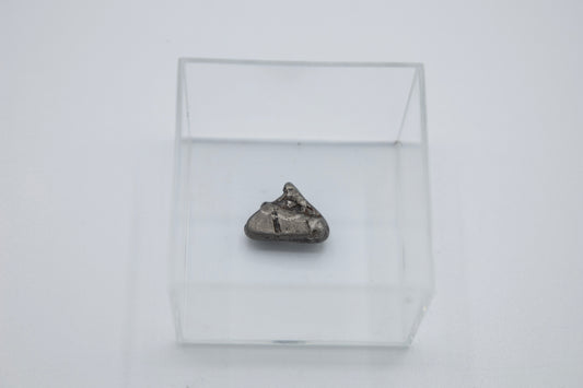 Meteorit in Lupenglas